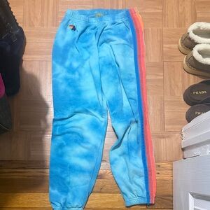 Aviator Nation Blue Tie-Dye Joggers with Rainbow Stripes